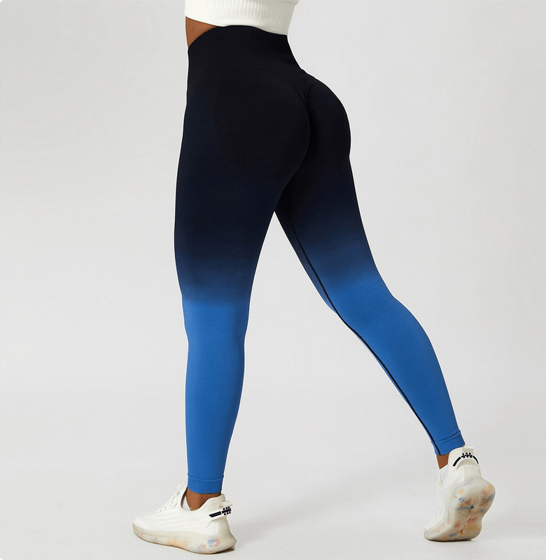 Woman wearing blue gradient high waist yoga leggings, perfect for yoga and active workouts.